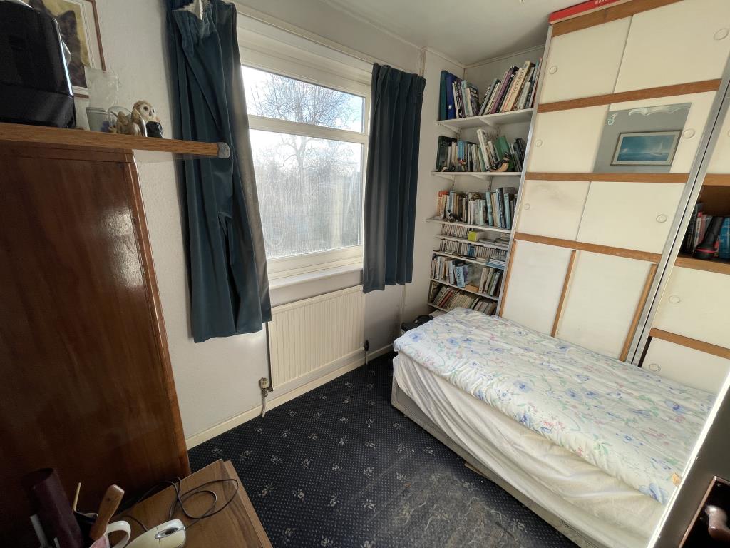 Lot: 86 - DETACHED HOUSE FOR INVESTMENT OR OWNER-OCCUPATION - Inside image of another rear bedroom from hallway